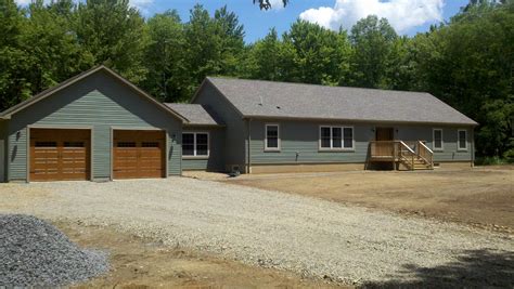 metal ranch homes with garages